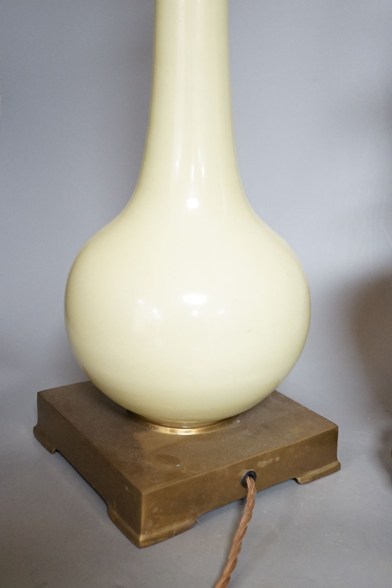 Two Chinese celadon glazed converted lamps, 44cm